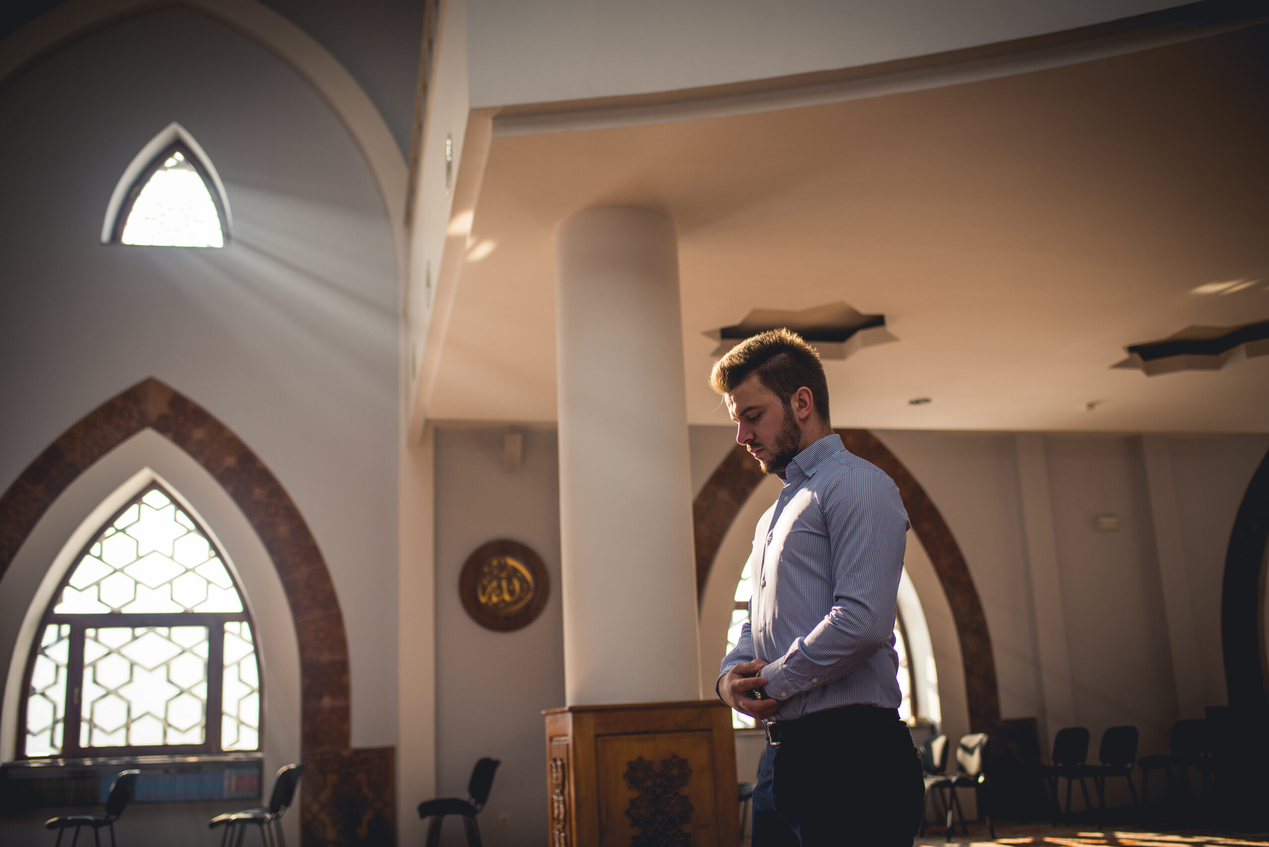 Man standing and praying